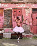 Ballet Photographed In Front Of A Pink Wall